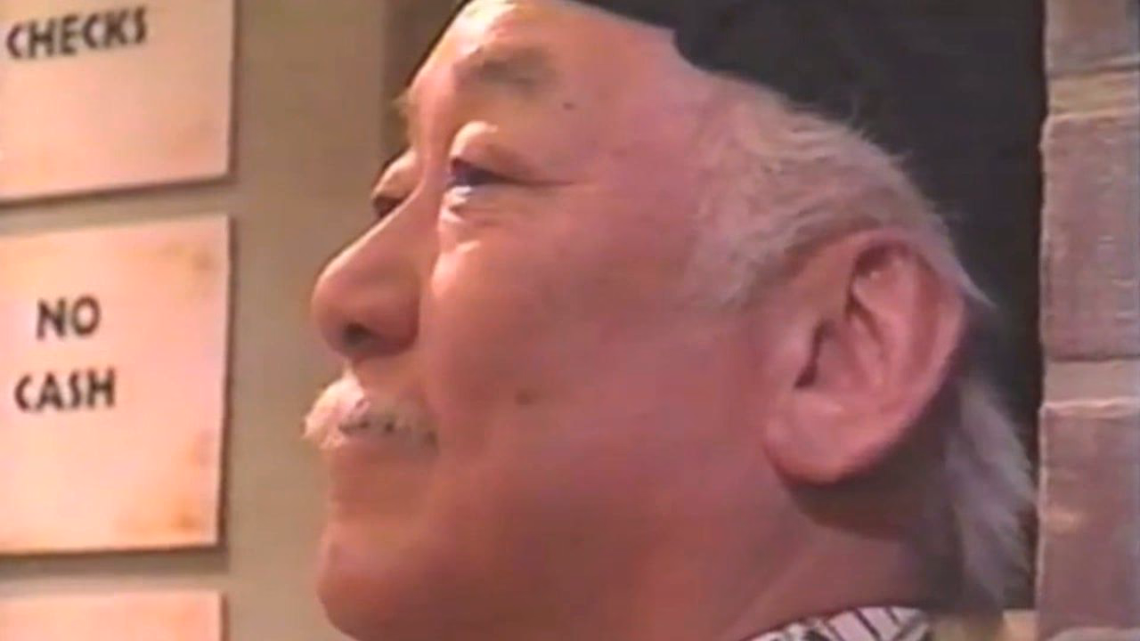 Pat Morita in profile on the KangaRoddy set, smiling off-camera